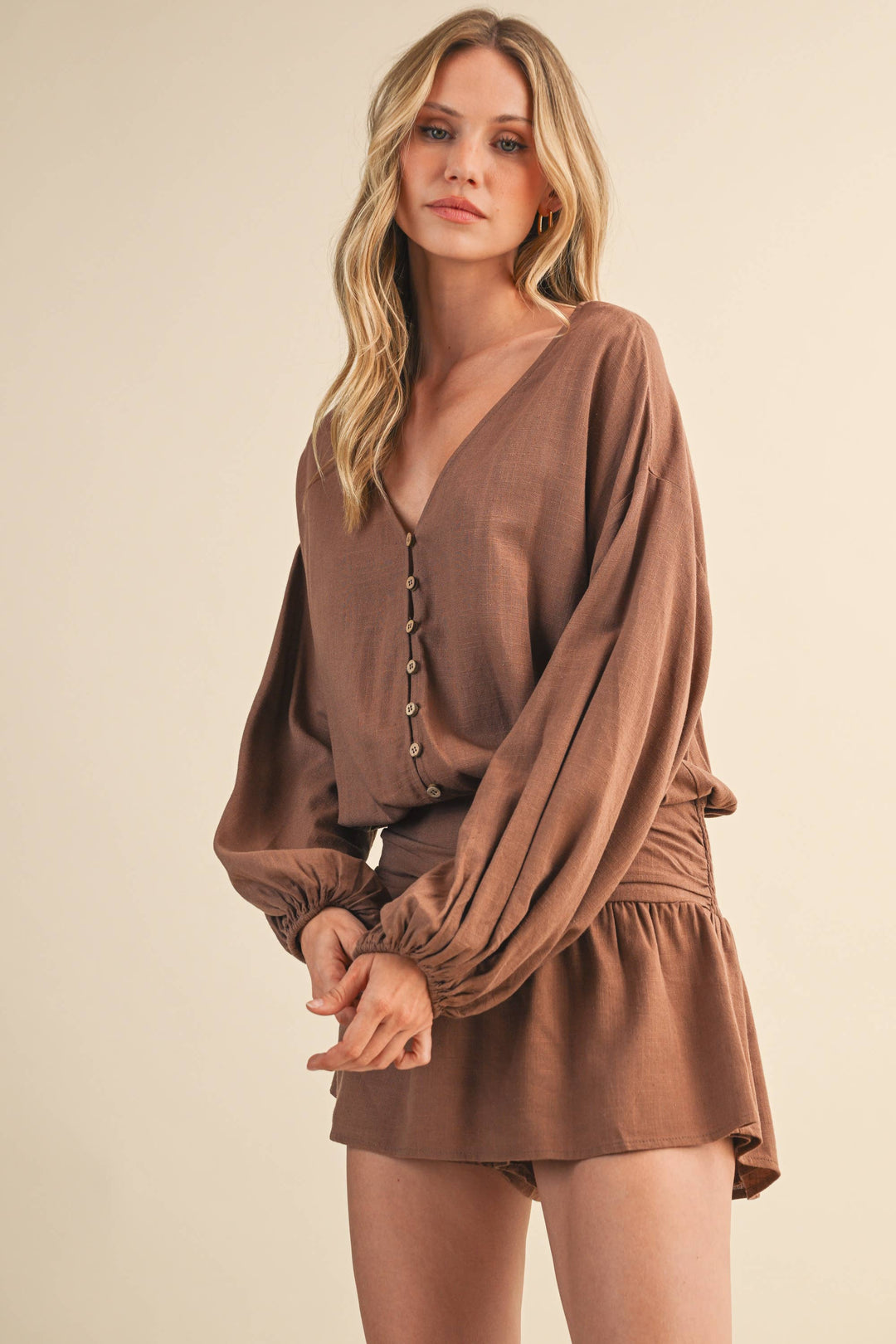 LINEN LONGSLEEVE BUTTON AND SMOCKED WAIST ROMPER - Rompers