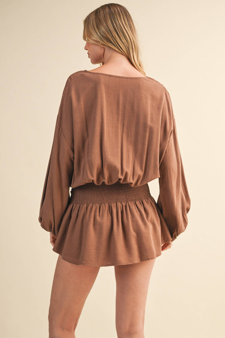 LINEN LONGSLEEVE BUTTON AND SMOCKED WAIST ROMPER - Rompers