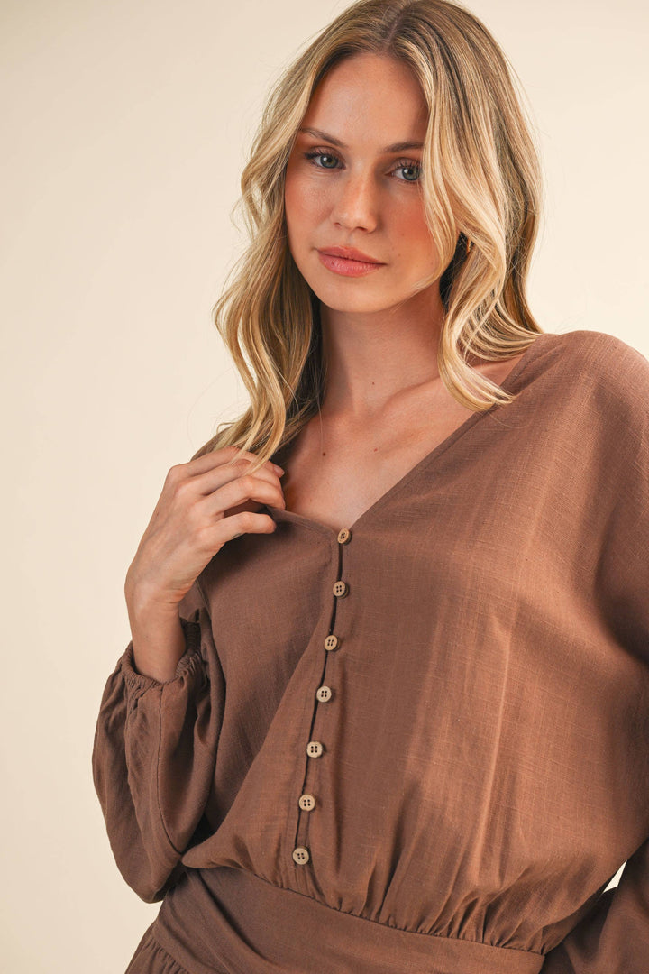 LINEN LONGSLEEVE BUTTON AND SMOCKED WAIST ROMPER - Rompers